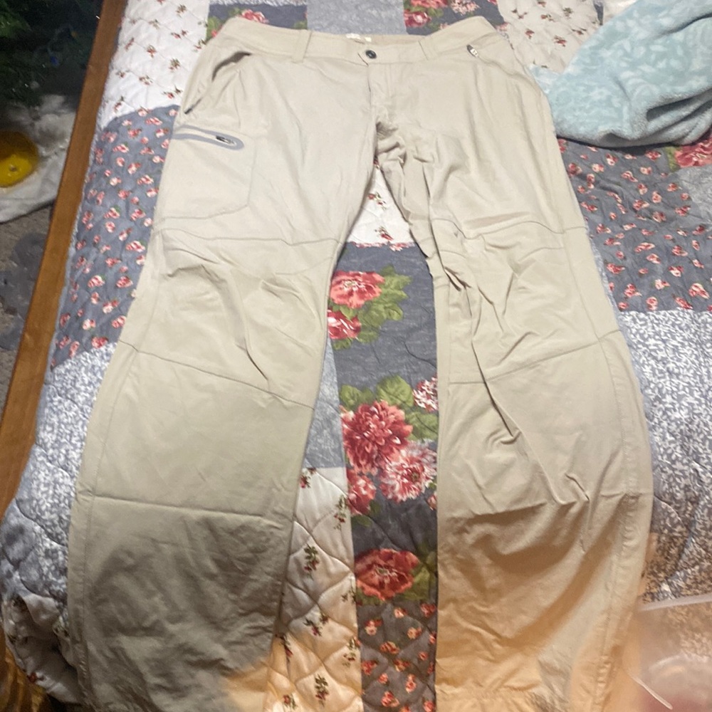 Women’s pants color beige tons of zipper on the sides for car keys phone exc.